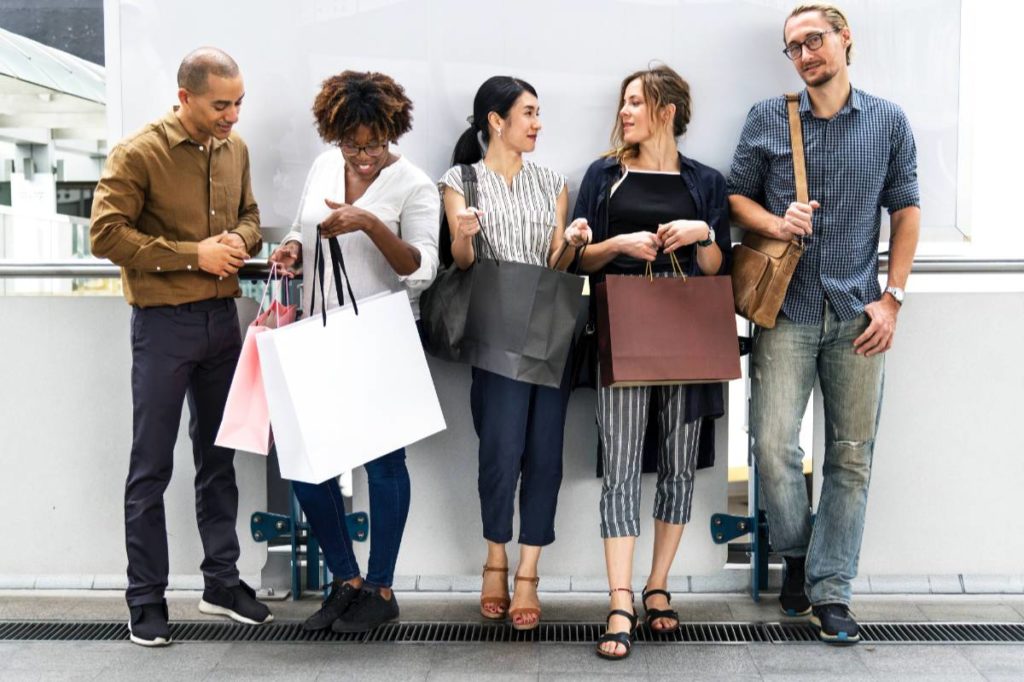 Group on phones shopping.